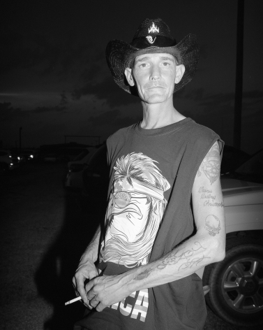 Patrice Aphrodite Helmar  Man in parking lot at Oklahoma Rodeo, 2017  C-print  76 x 61 cm / 30 x 24 in  Edition of 5 + 2 AP