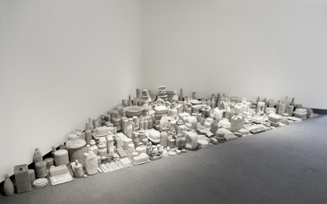 Erin Woodbrey  Cities in Dust (Corner Piece), 2022  Found objects encased in wood ash, plaster, and gauze  5.1 x 5.1 x 4.5 m / 17 ft x 17 ft x 15 ft